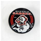 Lot of Buffalo Sabres and Chicago Blackhawks NHL Team Pucks