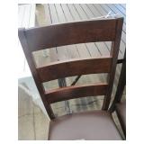 Pair of A-America CTRRT255K Carter Collection 40" Side Chairs with Ladderback, Faux Leather Upholstery - Cut on Seat