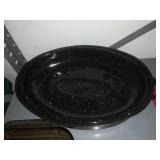 Lamps, roaster pan, Pyrex baking dishes.