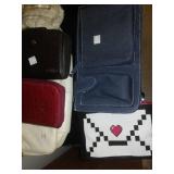 Purses, wallets, clutches, bags.