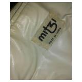 Purses, wallets, clutches, bags.