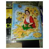 Collectible magazines, art and & tin.