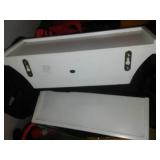 Miscellaneous floating shelves, harness, casters, orange cone and more.