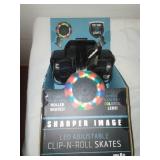 New clip - n - roll roller skate attachments.