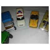 NERTL John Deere ATV toy and Matchbox and Hot wheels.