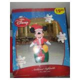 Mickey Mouse inflatable with Christmas laser lights.