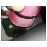 Grumpy flowerpot and solar statue.