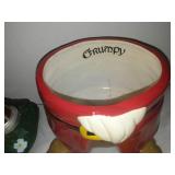 Grumpy flowerpot and solar statue.