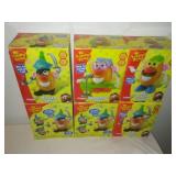 6 Mr. Potato Head new in boxes.