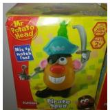 6 Mr. Potato Head new in boxes.