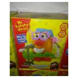 6 Mr. Potato Head new in boxes.
