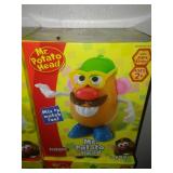 6 Mr. Potato Head new in boxes.