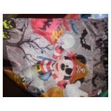 Tote and cover full of garden banners and flags.