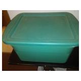 Tote and cover full of garden banners and flags.