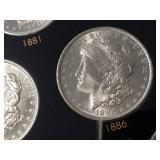 DATE SET OF 27 AU-BU MORGAN SILVER DOLLARS IN CAPITAL HOLDER