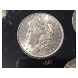 DATE SET OF 27 AU-BU MORGAN SILVER DOLLARS IN CAPITAL HOLDER