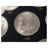 DATE SET OF 27 AU-BU MORGAN SILVER DOLLARS IN CAPITAL HOLDER