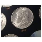 DATE SET OF 27 AU-BU MORGAN SILVER DOLLARS IN CAPITAL HOLDER
