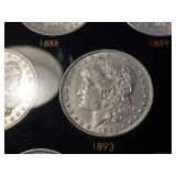DATE SET OF 27 AU-BU MORGAN SILVER DOLLARS IN CAPITAL HOLDER