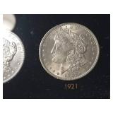 DATE SET OF 27 AU-BU MORGAN SILVER DOLLARS IN CAPITAL HOLDER