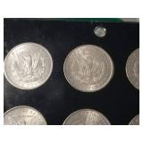 DATE SET OF 27 AU-BU MORGAN SILVER DOLLARS IN CAPITAL HOLDER