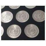 DATE SET OF 27 AU-BU MORGAN SILVER DOLLARS IN CAPITAL HOLDER