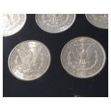 DATE SET OF 27 AU-BU MORGAN SILVER DOLLARS IN CAPITAL HOLDER
