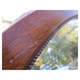 Antique Tiger Oak Beveled Glass Oval Wall Mirror