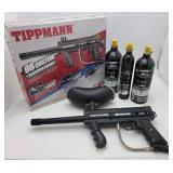 Tippmann Paintball Gun w/ 3 unopened Bottles