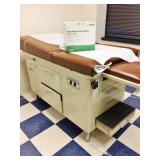 MSRP $1200 Super Nice FAMILY PRACTICE OB/GYN MEDICAL VETERINARIAN TREATMENT EXAMINATION TABLE WITH STEP UP STOOLS, TUCKAWAY STIRRUPS, STORAGE DRAWERS & 1 DOOR CABINET ALSO INCLUDES EXTRA PAPER ROL