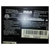 RCA flat screen TV 32in with remote.