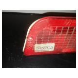 Polaris snowmobile taillight housing and lens - new.