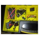 Portable storage case with electrical contents.