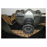 Pentax Honeywell 35 mm camera, lens and strap.