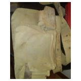 2 leather tool belts and cooler.