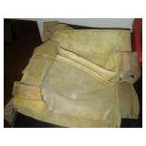 2 leather tool belts and cooler.