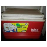 2 leather tool belts and cooler.