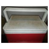 2 leather tool belts and cooler.