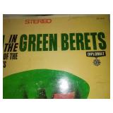 Two albums - snoopy versus the Red Baron and men in the Green Beret