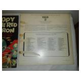 Two albums - snoopy versus the Red Baron and men in the Green Beret