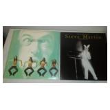 2 comedy albums - George Carlin and Steve Martin.