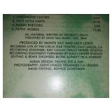 2 comedy albums - George Carlin and Steve Martin.