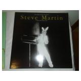 2 comedy albums - George Carlin and Steve Martin.