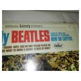 The early Beatles album with cellophane and price tag near mint condition.