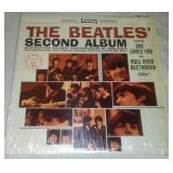 The Beatles second album with cellophane and price tag near mint condition.
