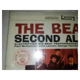 The Beatles second album with cellophane and price tag near mint condition.