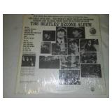 The Beatles second album with cellophane and price tag near mint condition.