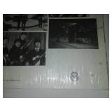 The Beatles second album with cellophane and price tag near mint condition.