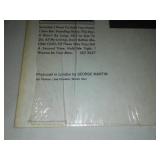 The Beatles second album with cellophane and price tag near mint condition.