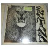 2 near mint Carlos Santana.